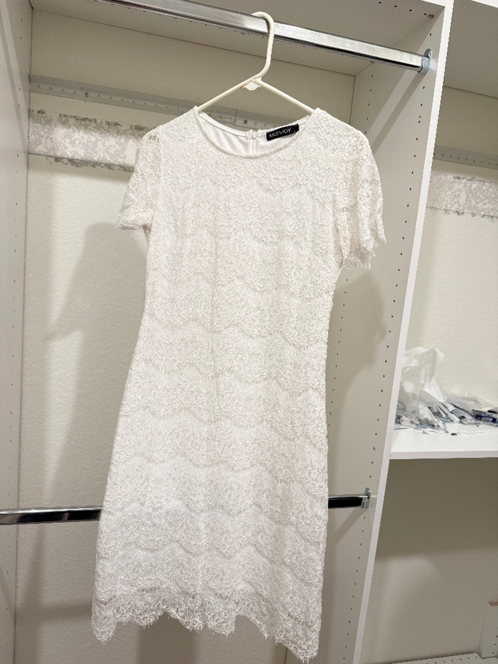 White mid length dress